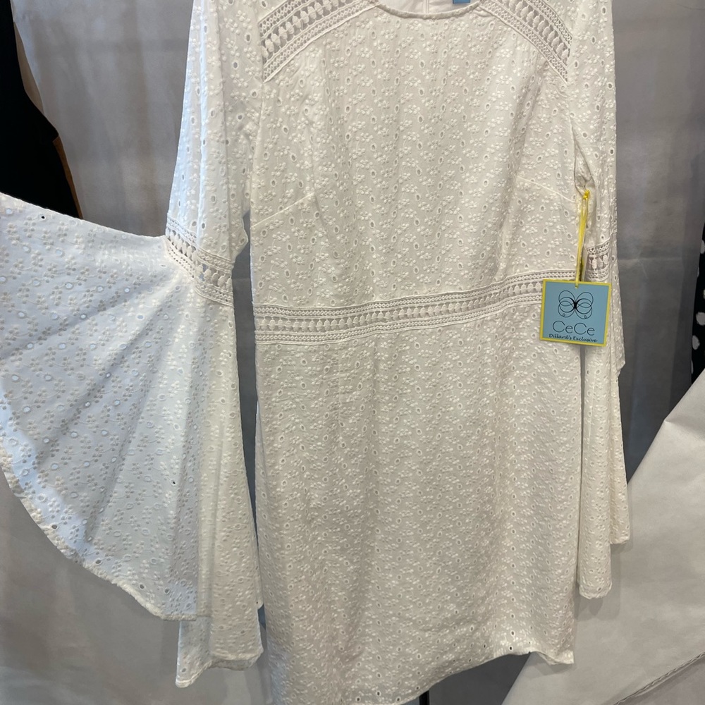 White eyelet bell sleeve dress